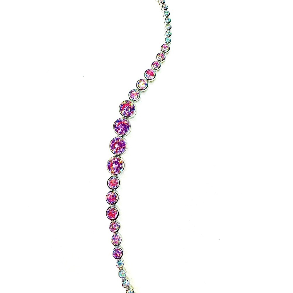 Sterling Silver & Vibrant Pink Bezel Set CZ Stones Adorn This Fab Bracelet